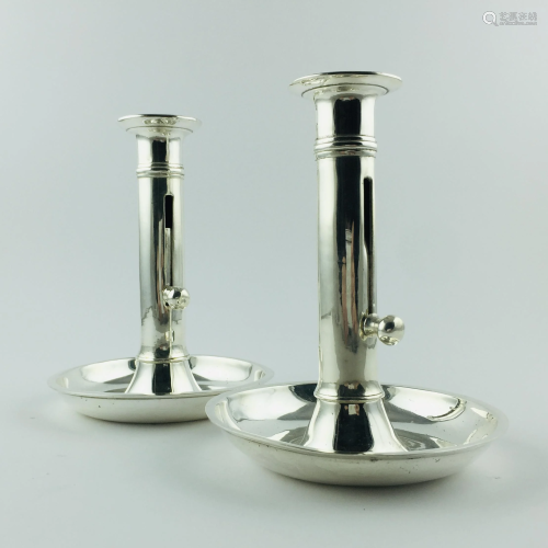 Pair of candlesticks in smooth silver plated metal