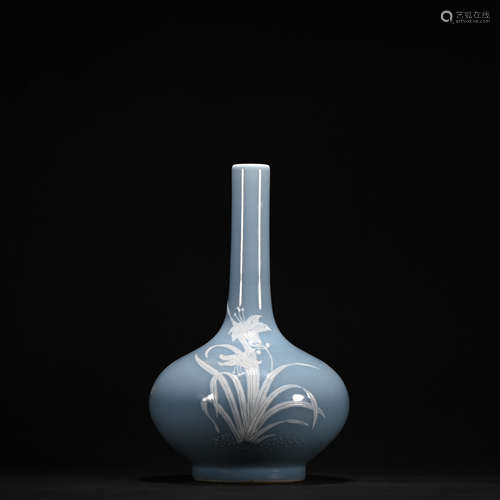 A blue glazed vase