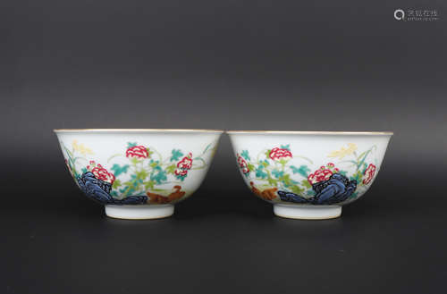 A pair of enamel 'floral and birds' bowl