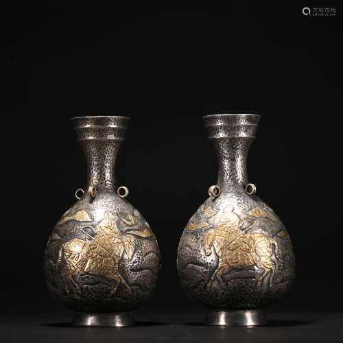 A pair of silver vase