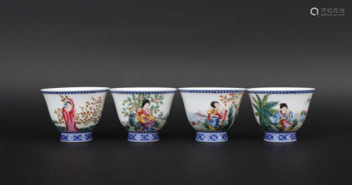 A set of enamel 'maid' cup