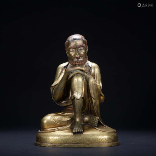 A gilt-bronze statue of Snow mountain master