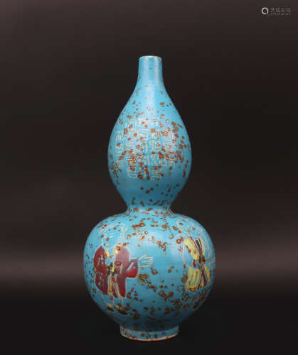 A Ding kiln 'figure' gourd-shaped vase