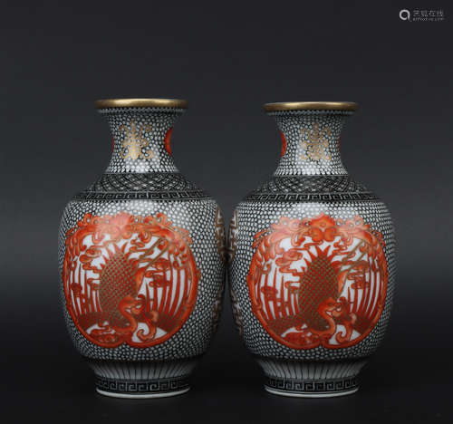 A pair of allite red glazed bottle painting in gold