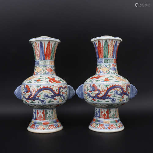 A pair of Wu cai 'floral' vase