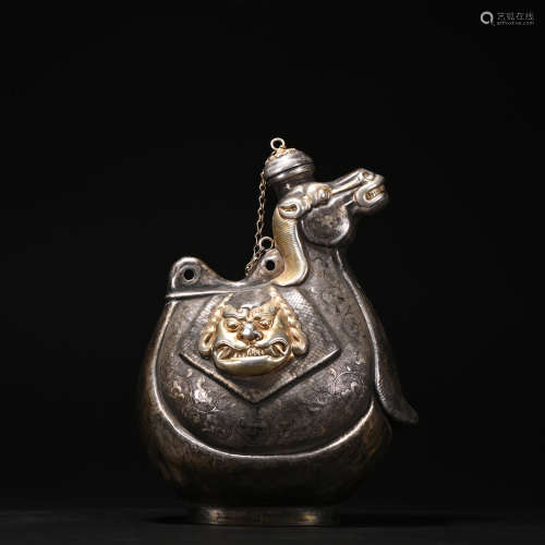 A silver camel pot
