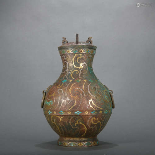 A bronze vase ware with gold and silver