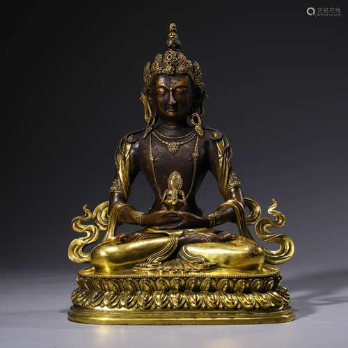 A gilt-bronze statue of Amitayus