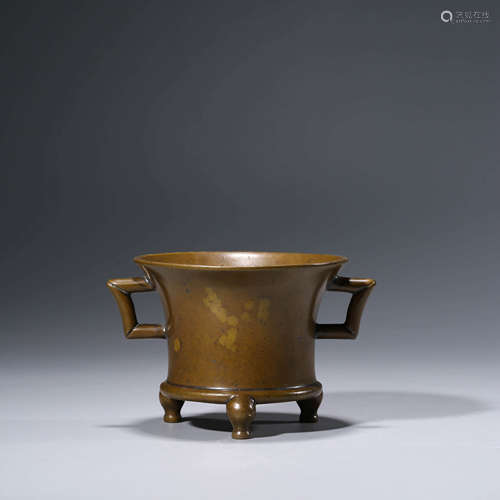 A bronze double-eared tripod censer