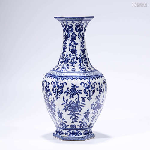 A blue and white floral hexagonal vase