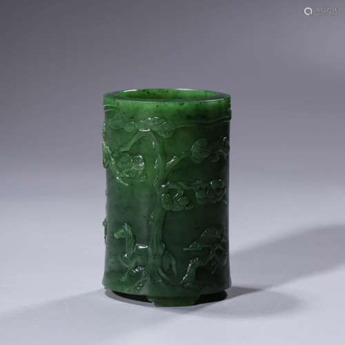 An inscribed spinach-green jade figure and pine brush pot