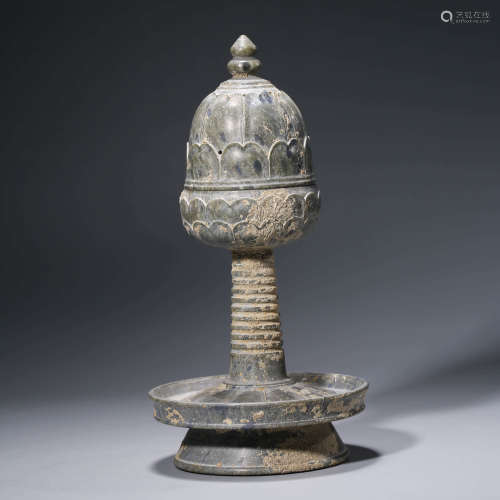 a carved stone lotus shaped incense burner