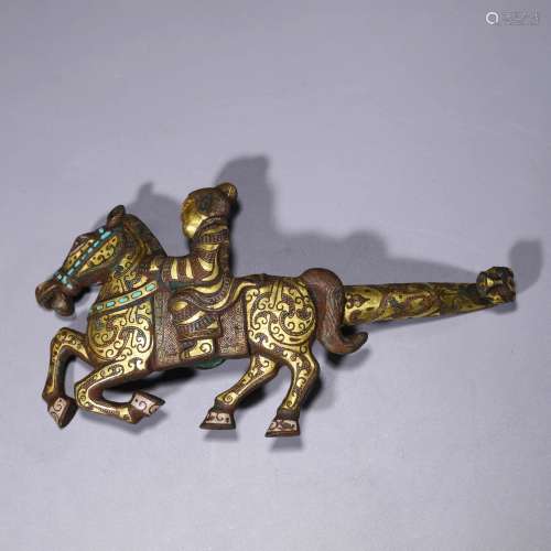 A gilt-bronze figure horsing belt hook
