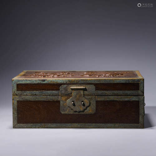 A carved wood furnishing rectangular box with cover