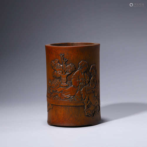 An inscribed wood figure brush pot