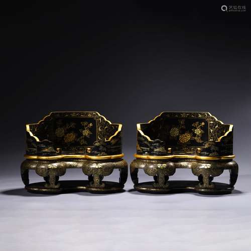 A pair of gilt-lacquered chairs