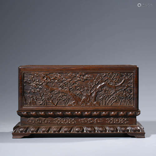 A carved rosewood pine and  plum blossom rectangular box and...