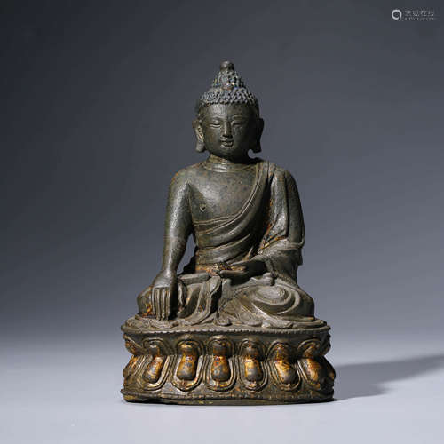 a gilt-bronze statue of shakyamuni