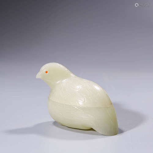 A carved white jade bird-formed box and cover