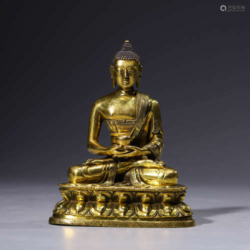 a gilt-bronze statue of shakyamuni