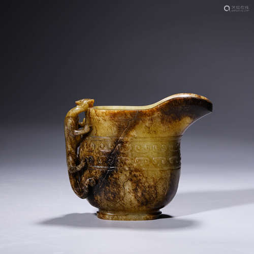 An archaistic russet jade chi dragon-eared jue cup