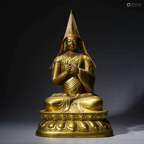 A gilt-bronze statue of guru