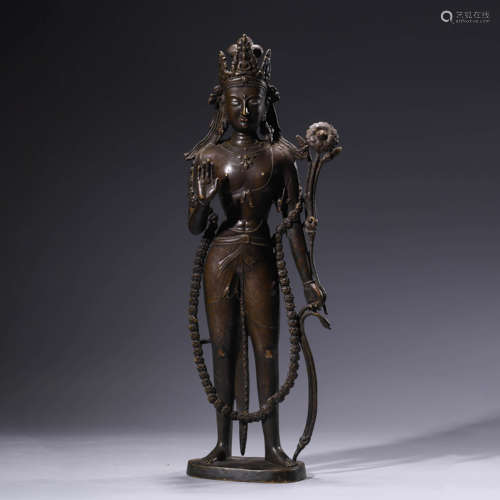 A gilt-bronze statue of guanyin