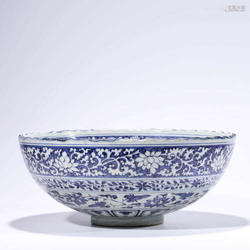 A blue and white floral lobed bowl