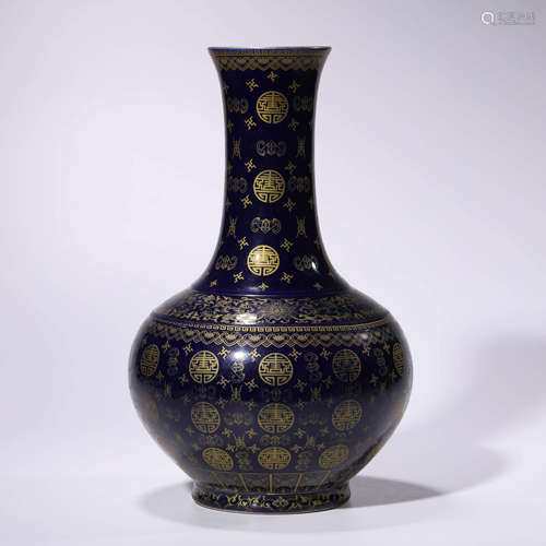 A gilt blue-glazed fu&shou bottle vase