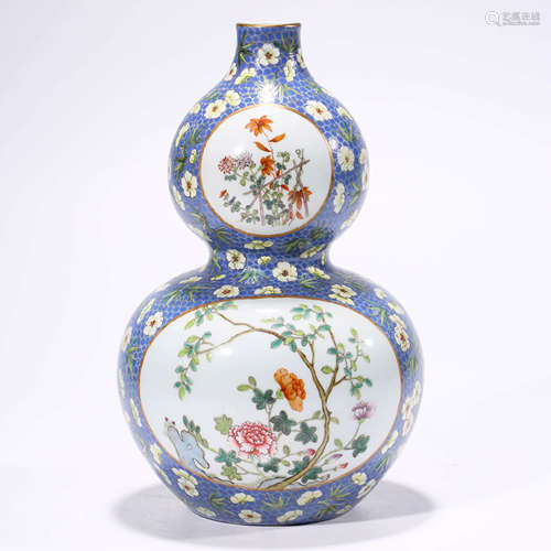 A famille rose floral double-gourd-shaped vase