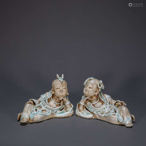 A PAIR OF CHINESE SONG DYNASTY HUTIAN WARE BOYS