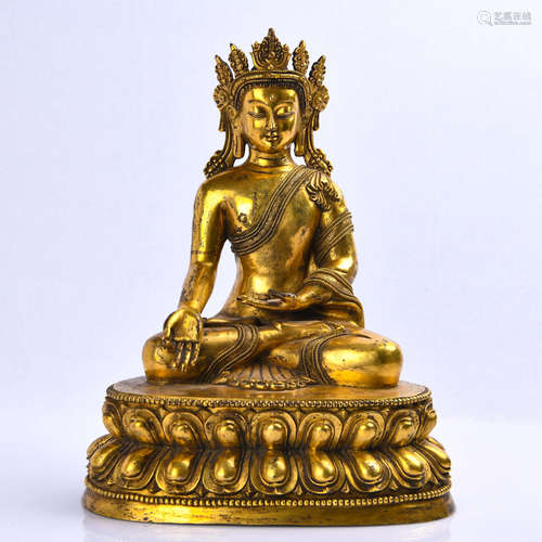 A Gilt Bronze Seated Shakyamuni