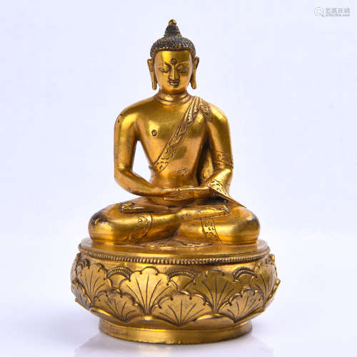 A Gilt Bronze Seated Shakyamuni