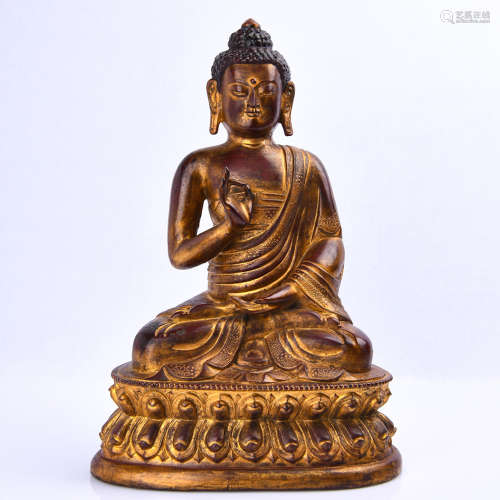 A Gilt Bronze Seated Shakyamuni