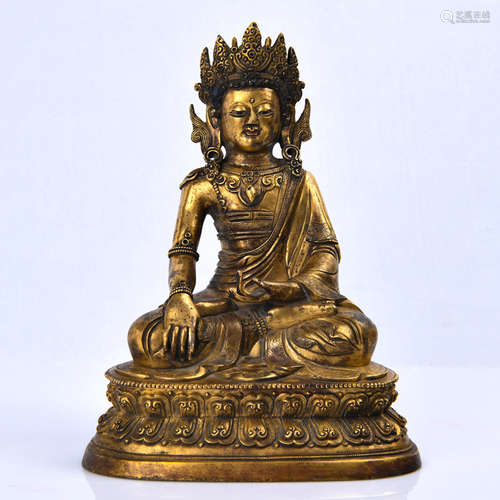 A Gilt Bronze Seated Shakyamuni