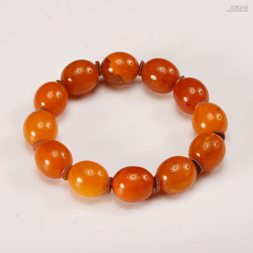 A Chinese Honey Amber Bead Bracelet