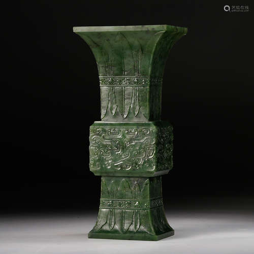 A Spinach Jade Archaistic Style Vessel