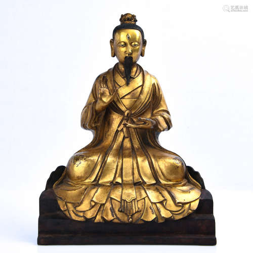 A Gilt Bronze Seated Daoist Figurine