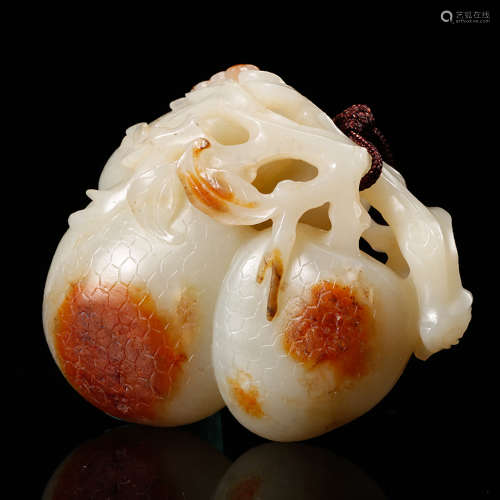 A White Jade Pendant Of Lychee