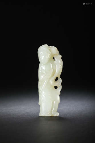 A Celadon Glazed Figurine