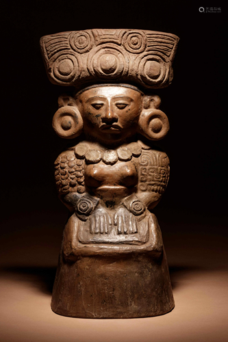 A Maya Molded Female Personage Height 18 inches.