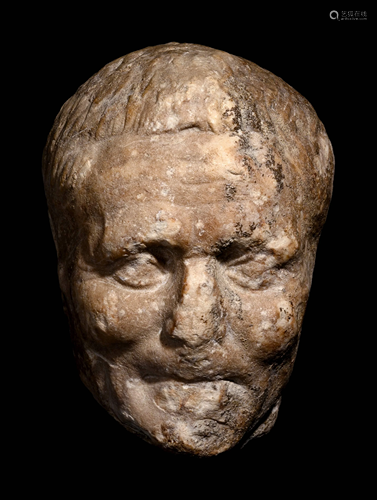 A Roman Marble Head of a Man Height 10 1/2 inches.