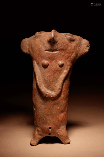 A Quimbaya Terracotta Figure Height 7 inches.