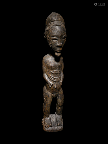 A Baule Figure Height 15 1/2 inches.