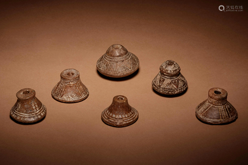 A Group of Six Quimbaya Terracotta Spindle Whorls Width