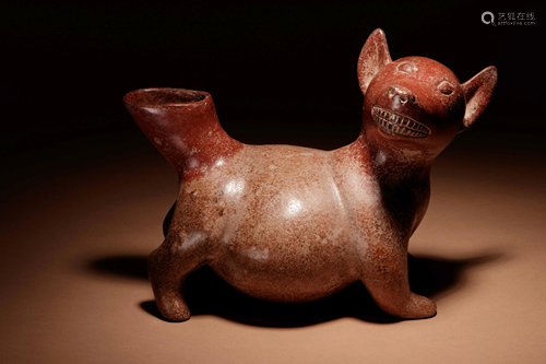 A Colima Terracotta Dog Effigy Vessel Width 12 inches.