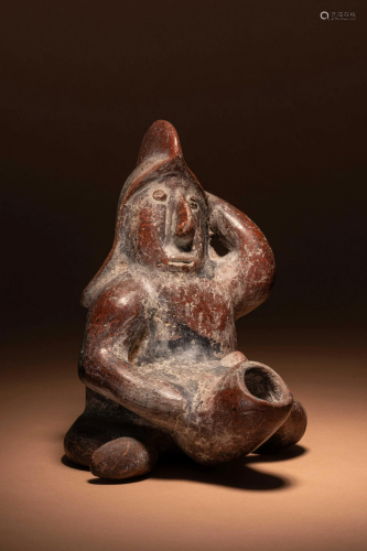 A Colima Terracotta Erotic Effigy Vessel Height 9