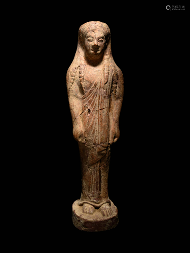 A Greek Terracotta Kore Height 10 inches.