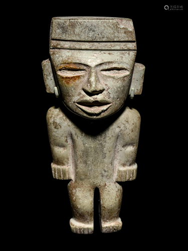 A Teotihuacan Greenstone Figure Height 8 1/2 inches.