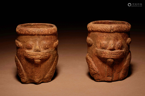 A Pair of Calima Terracotta Vessels Height of each 3